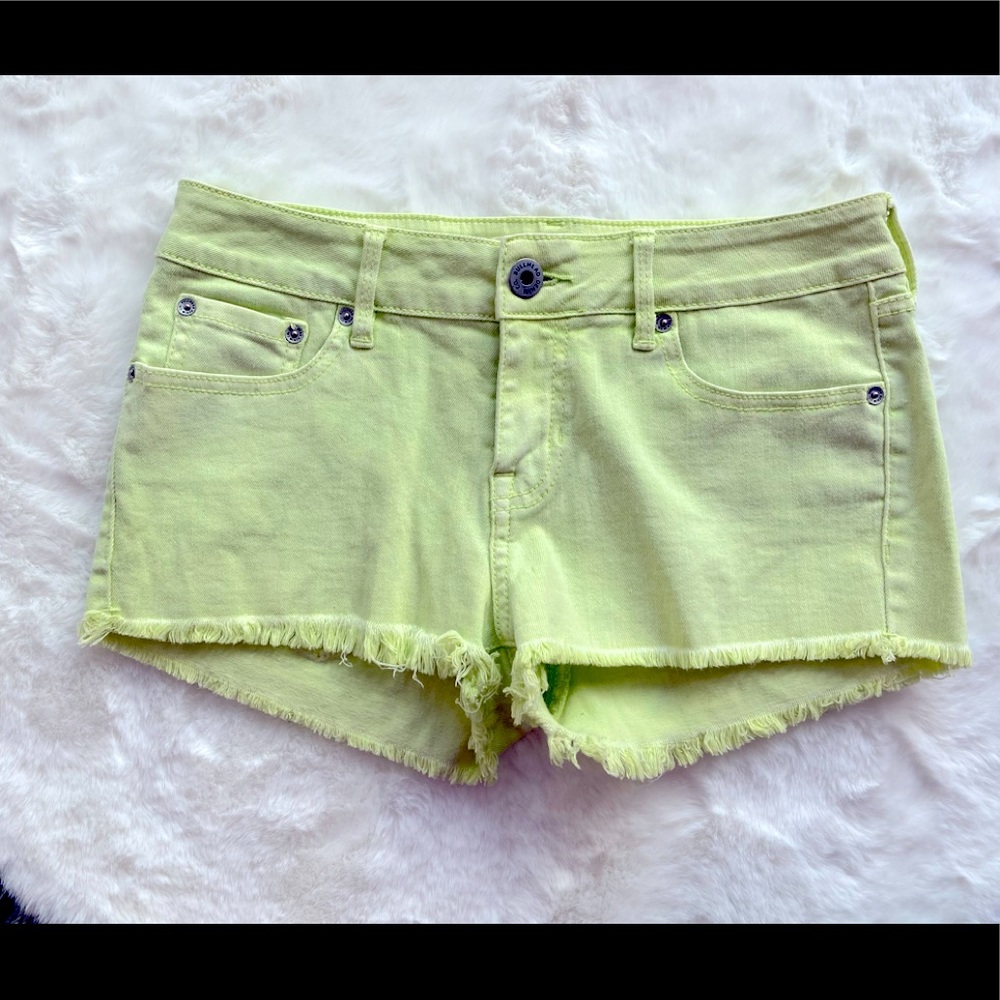 Pastel lime green denim shorts